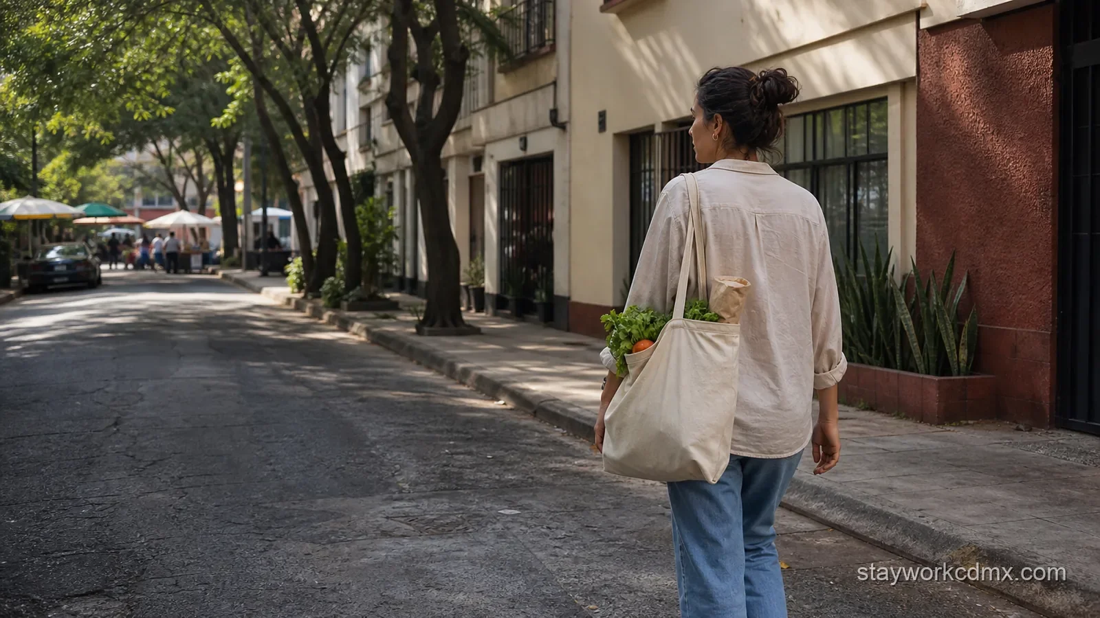 Escandón resident carrying market groceries along a tree-lined Mexico City street during a weekday food routine