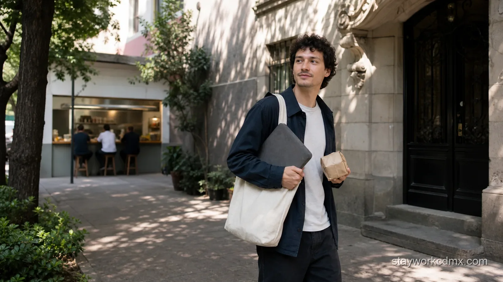 A remote worker leaves a small Roma Norte lunch counter and walks toward a residential apartment after a work break.