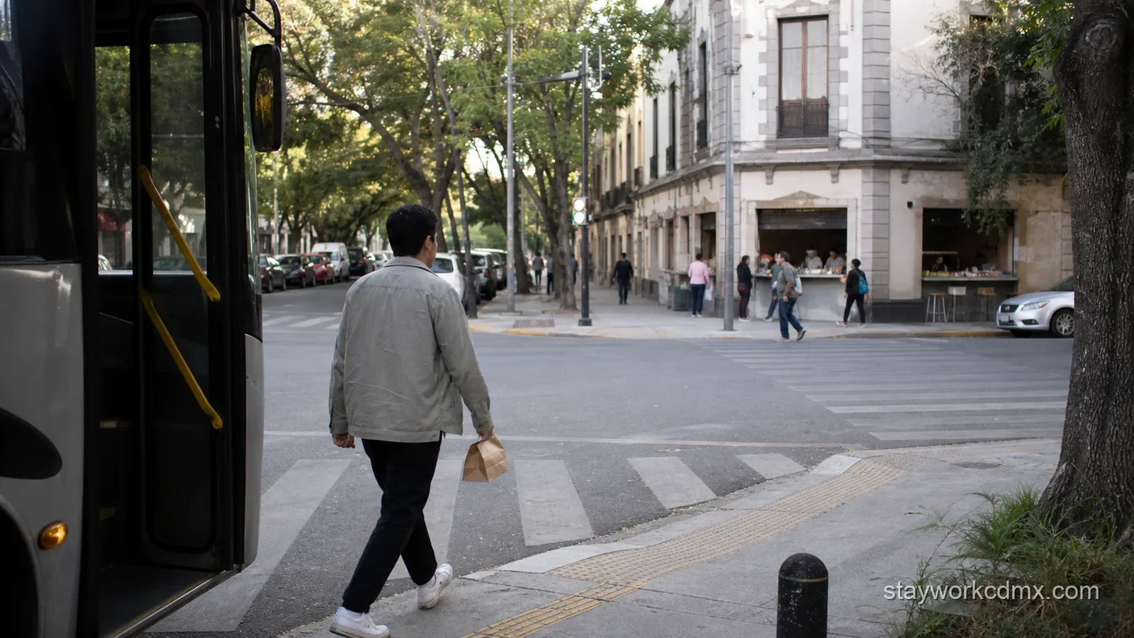 Long-stay renter walking from transit toward an everyday food stop in Santa María la Ribera.