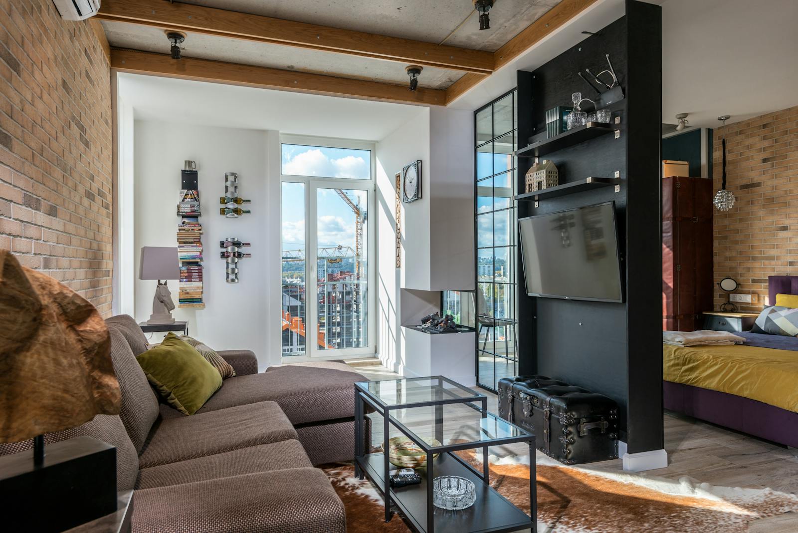 Modern dining and living area with large windows — monthly furnished apartment CDMX